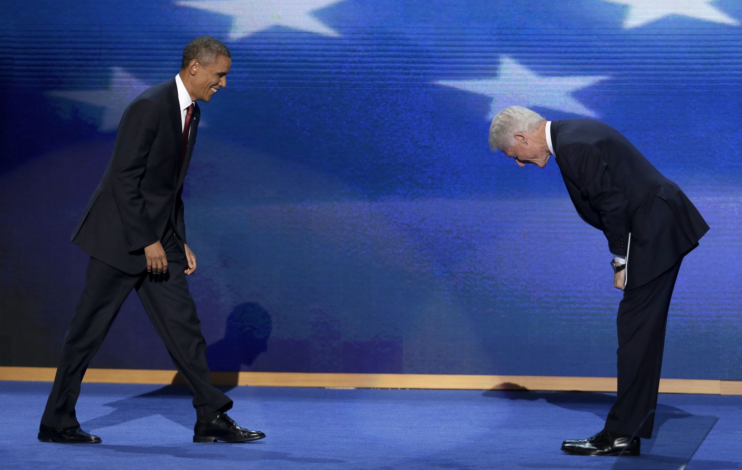 Photo: Former President Clinton bows to President Obama