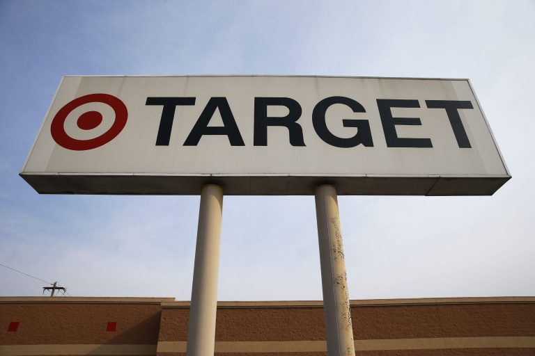 Target is asking its customers to please leave their guns outside, saying the open carrying of firearms is at odds with 