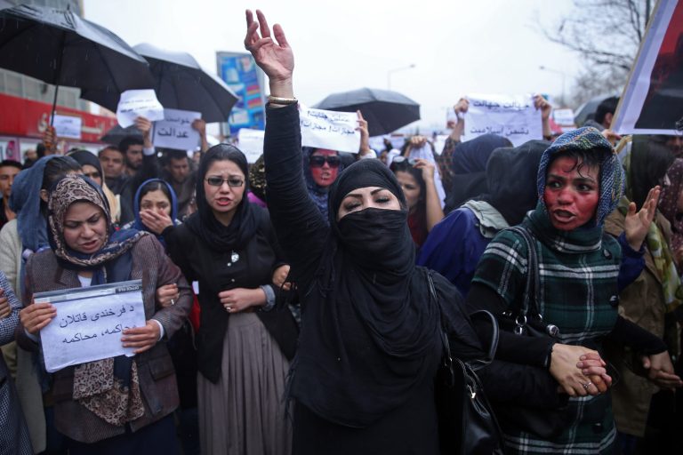 Afghan women chant slogans during a protest demanding justice for a woman who was beaten to death by a mob after being falsely accused of burning a Quran last week, in downtown Kabul, Afghanistan, Tuesday, March 24, 2015. (AP Photo/Massoud Hossaini)