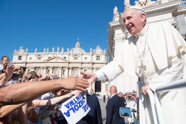 Pope Francis greets faithful during his weekly general audience at the Vatican, Wednesday, Aug. 24, 2016. (L'Osservatore Romano/Pool Photo via AP)