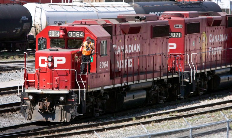 In this May 16, 2012 photo, Canadian Pacific Railway locomotives move cars at a rail yard in Calgary, Alberta. Canadian Pacific Railway on Monday, Oct. 20, 2014 said it has ended talks with U.S. counterpart CSX about a possible combination and plans no more discussions. (AP Photo/The Canadian Press, Jeff McIntosh)