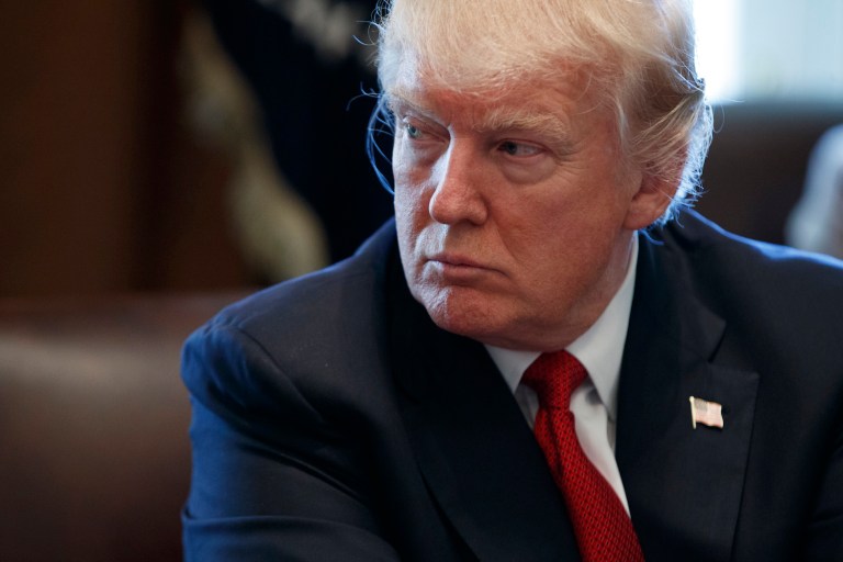 Trump does the work Speaker Ryan can't do bringing the caucus into line. (AP Photo/Evan Vucci)