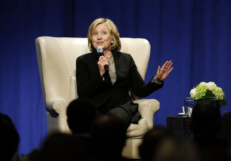 Former U.S. Secretary of State Hillary Rodham Clinton speaks to the Economic Club of Chicago at Fairmont Hotel in Chicago on Wednesday, Oct. 8, 2014. Clinton lent a hand to Illinois Gov. Pat Quinn's re-election campaign Wednesday with a fundraiser and a quick, controlled public appearance in a chat over coffee. (AP Photo/Nam Y. Huh)