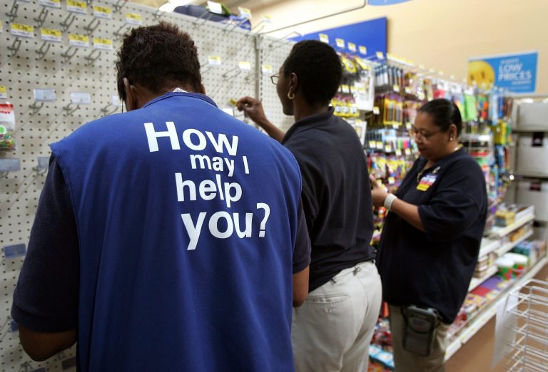 Wal-Mart employees stock items in a new 142,000 square foot Wal-Mart store on September 26, 2006 in Chicago, Illinois the day before it opens on September 27. (Photo by Tim Boyle/Getty Images)