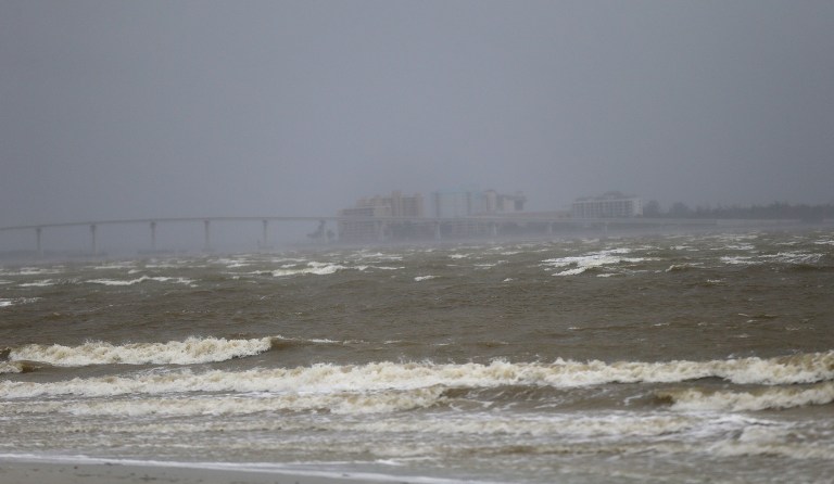 Fort Myers is seen as surf and winds begin to kick up in advance of Hurricane Irma, in Sanibel Island, Fla., Sunday, Sept. 10, 2017. Irma as turned towards the West coast of Florida and may give the Tampa area its first direct hit from a major hurricane in nearly a century. (AP Photo/Gerald Herbert)