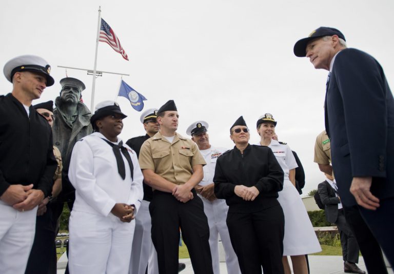 Secretary of the Navy Ray Mabus, right, talks with U.S. Navy personnel from the Naval Operations Support Center (NOSC) in White River Junction following a ceremony announcing the naming of a fast-attack submarine after the state of Vermont, Thursday, Sept. 18, 2014, in Burlington, Vt. The USS Vermont is the first U.S. Navy vessel to be named after the Green Mountain State in more than 100 years. (AP Photo/Burlington Free Press, Ryan Mercer) NO SALES; MANDATORY CREDIT; TV OUT; INTERNET OUT