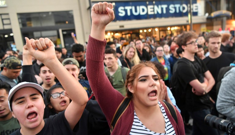 Protesters shout before a speaking engagement by Ben Shapiro on the campus of the University of California, Berkeley. (AP Photo/Josh Edelson)