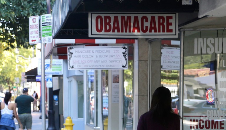 The increase in premiums will cause some people to become uninsured. (AP Photo/Lynne Sladky)