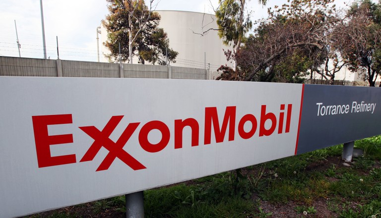 The lawmakers accuse Exxon Mobil and other firms of hiding how burning fossil fuels affects climate change. (AP Photo/Reed Saxon, File)