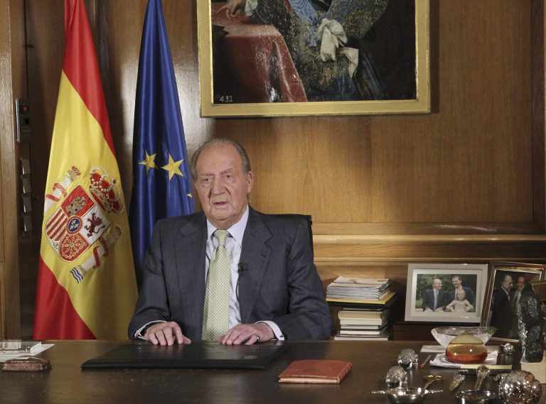 In this photo released by the Royal Palace on Monday June 2, 2014 and distributed by Spain's national agency EFE, Spain's King Juan Carlos makes a televised speech Monday in the Zarzuela Palace in Madrid  announcing his  abdication. Spain's King Juan Carlos plans to abdicate and pave the way for his son, Crown Prince Felipe, to take over, Spanish Prime Minister Mariano Rajoy told the country Monday in an announcement broadcast nationwide. The 76-year-old Juan Carlos oversaw his country's transition from dictatorship to democracy but has had repeated health problems in recent years. (AP Photo/Spanish Royal Palace/EFE)