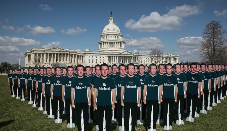 Cutouts of Facebook CEO Mark Zuckerberg appear on the east lawn of the Capitol ahead of his testimony before a joint hearing of the Senate Judiciary and Commerce Committees, Tuesday, April 10, 2018.