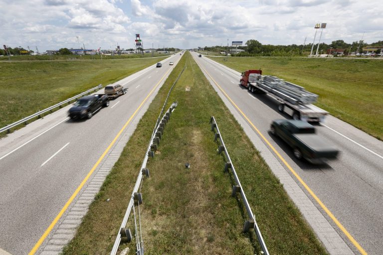 Vehicles move along a section of Interstate 70 in Foristell, Mo. Missouri voters will decide on Aug. 5 whether to allow the state's first general sales tax for transportation projects, such as the proposed widening of I-70 to three lanes from St. Louis to Kansas City. (AP Photo/Jeff Roberson)