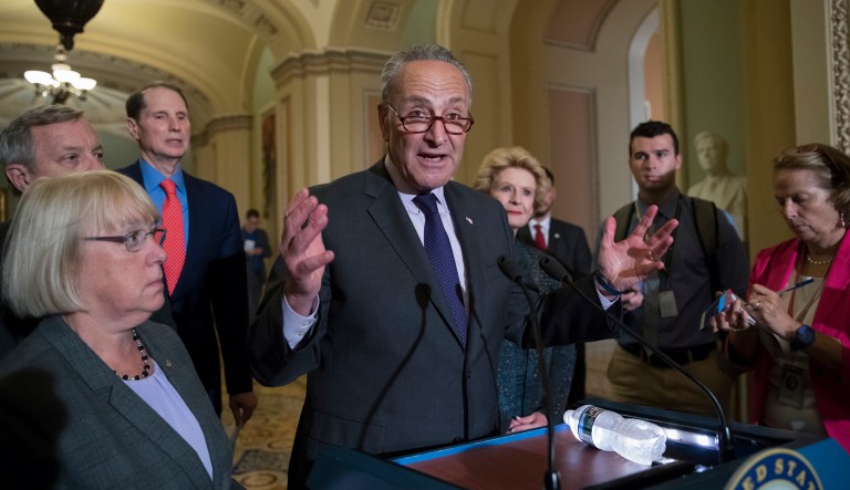 Senate Democrats, in a letter to President Trump and Senate Republicans, said the tax reform legislation can't include tax cuts for the top 1 percent of income earners or add to the federal deficit. (AP Photo/J. Scott Applewhite)