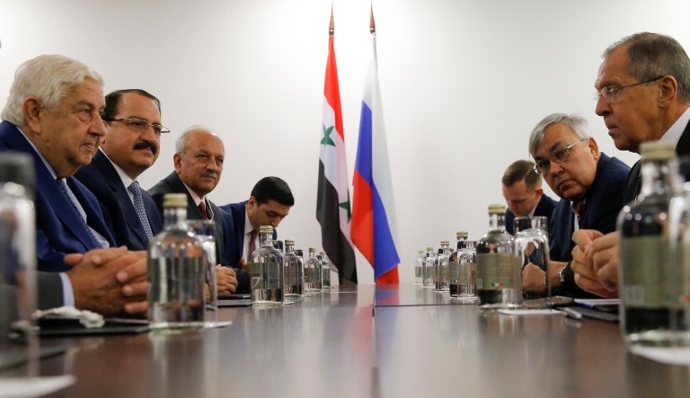 Russian Foreign Minister Sergei Lavrov, right, and his Syrian counterpart Walid al-Moualem attend a talks in the Black Sea resort of Sochi, Russia, Wednesday, Oct. 11, 2017. Lavrov and al-Moallem discussed the situation in Syria and efforts aimed at a political settlement. (Maxim Shemetov, Pool Photo via AP)