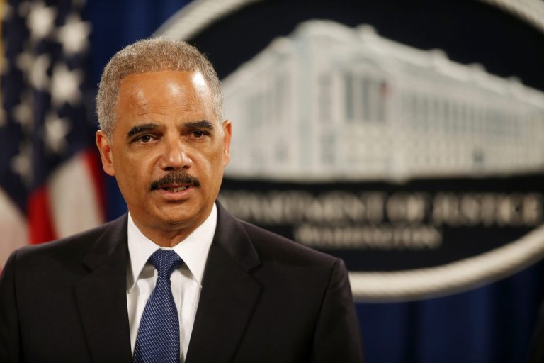 Attorney General Eric Holder speaks at a news conference at the Justice Department in Washington, Monday, May 19, 2014. Holder announced that a U.S. grand jury has charged five Chinese hackers with economic espionage and trade secret theft, the first-of-its-kind criminal charges against Chinese military officials in an international cyber-espionage case. (AP Photo/Charles Dharapak)