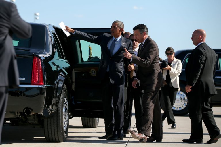 President Barack Obama speaks with Nevada Republican Gov. Brian Sandoval, center right, as he steps off Air Force One at McCarran International Airport in Las Vegas, Monday, Aug. 24, 2015. The governor was floated as a possible Supreme Court nominee. (AP Photo/Andrew Harnik)