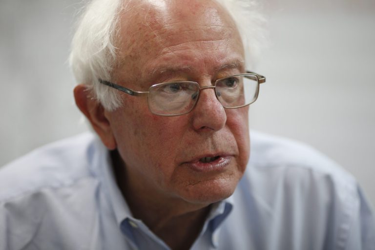 Sen. Bernie Sanders speaks with reporters after a town hall meeting last month in Las Vegas. (AP Photo/John Locher)
