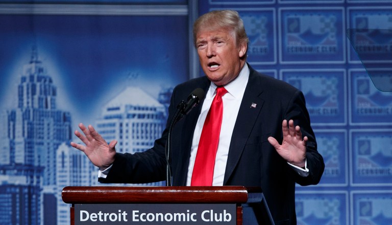Republican presidential candidate Donald Trump said that, with interest rates low, the U.S. should borrow money to spend on infrastructure rather than lowering the $14 trillion federal debt. (AP Photo/Evan Vucci)