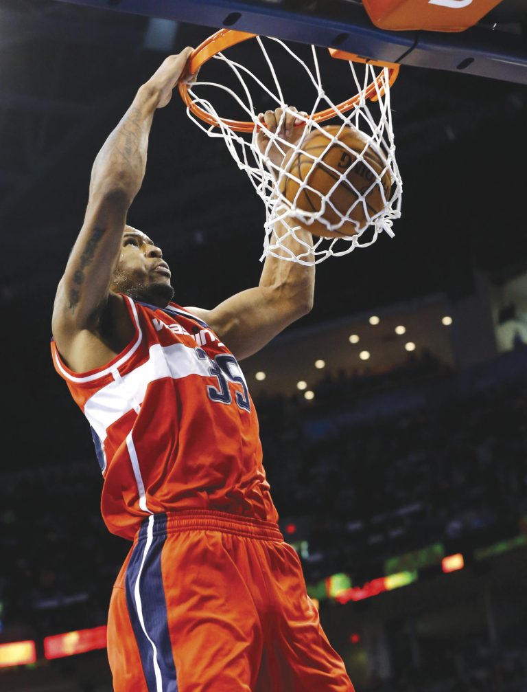 Sue Ogrocki/AP
Trevor Booker has started the last two games for the Wizards, who are down to eight dressed players because of injuries and illness.