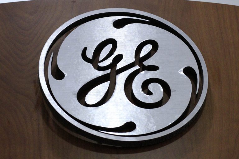 In this Thursday, Jan. 16, 2014, photo, a General Electric logo is displayed on a kitchen appliances in a H.H. Gregg store in Cranberry Township, Pa. (AP Photo/Gene J. Puskar)