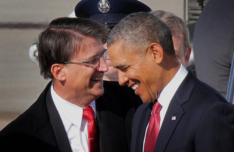 President Barack Obama is greeted by North Carolina Gov. Pat McCrory after Obama arrived on Air Force One at Raleigh-Durham International Airport in Morrisville, N.C. on Jan. 15.  North Carolina state leaders are once again embarking on a top-to-bottom review of state government. And once again, there's bound to be resistance to carry out changes.  (AP Photo/Ted Richardson)