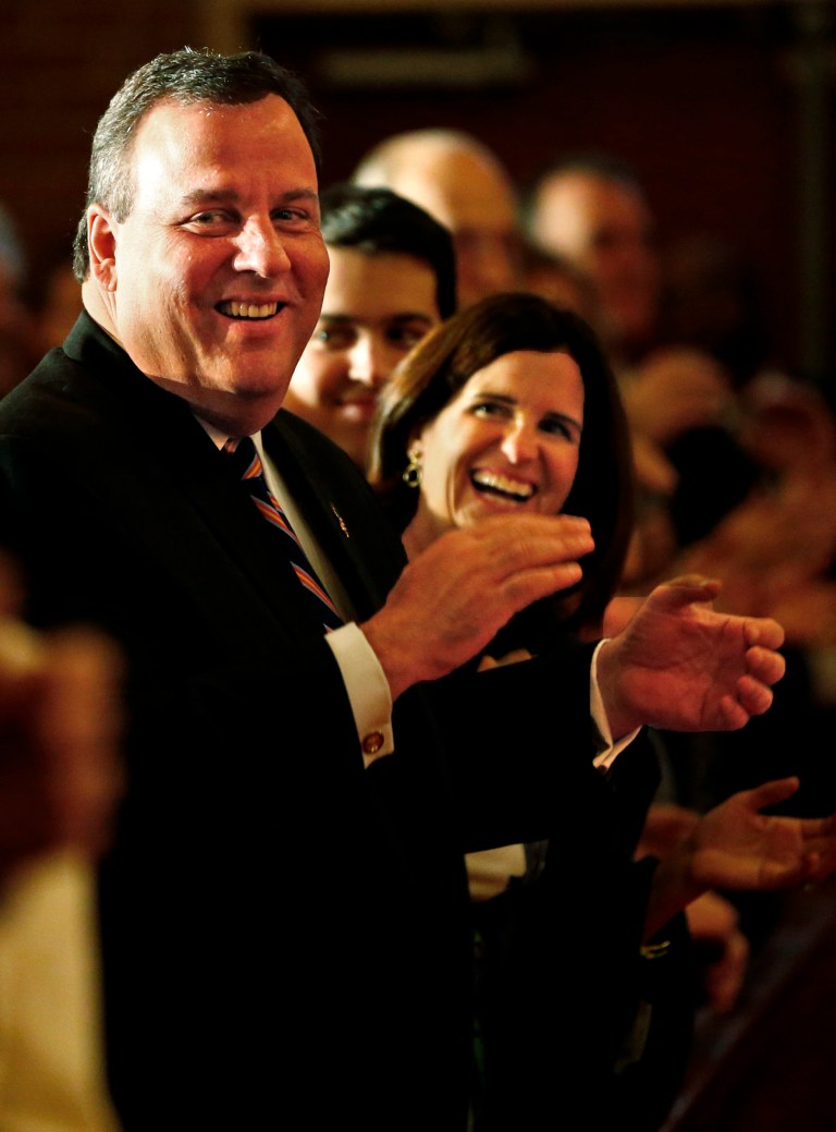 New Jersey Gov. Chris Christie and his wife, Mary Pat, applaud during a hymn as they attend a prayer service in celebration of his inauguration at the New Hope Baptist Church, Tuesday, Jan. 21, in Newark, N.J. (AP Photo/Rich Schultz)