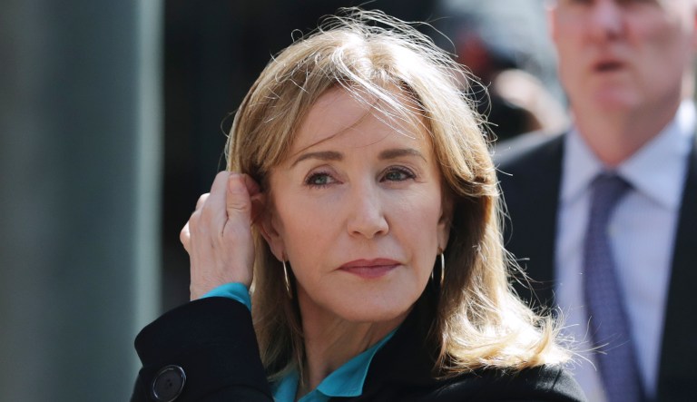 Actress Felicity Huffman arrives at federal court in Boston.