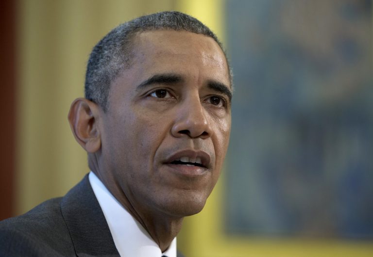 President Obama talks to media before signing the three-month highway funding bill, Friday, July 31, 2015, in the Oval Office of the White House in Washington. (AP Photo/Carolyn Kaster)