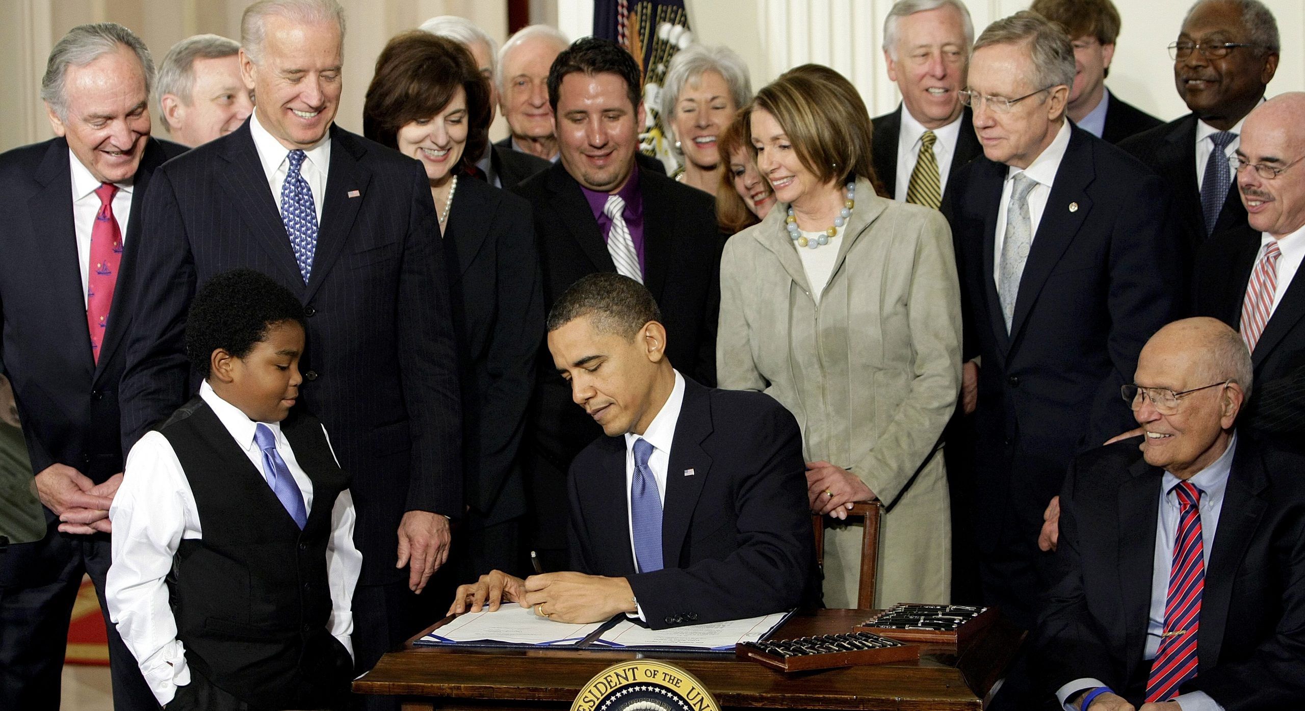 Five years later, the battle over Obamacare rages on