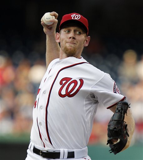 Washington Nationals starting pitcher Stephen Strasburg throws during the first inning of a baseball game with the Tampa Bay Rays, Wednesday, June 20, 2012, in Washington. (AP Photo/Alex Brandon)