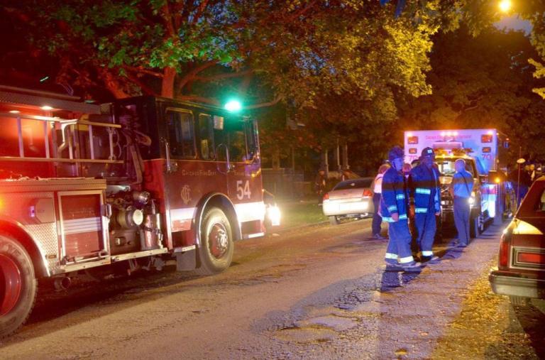 Chicago fire and police personnel respond to a shooting.