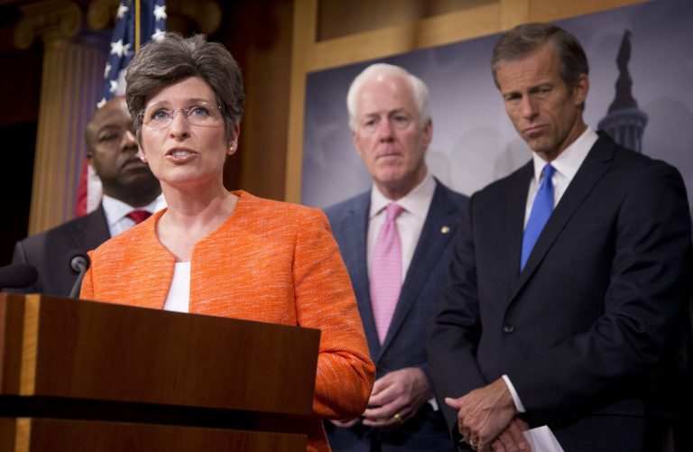 Sen. Joni Ernst, R-Iowa, from left, joined by Sens. John Cornyn, R-Texas, and John Thune, R-S.D., speaks about Planned Parenthood during a news conference on Capitol Hill in Washington, Wednesday, July 29, 2015. (AP Photo/Manuel Balce Ceneta)