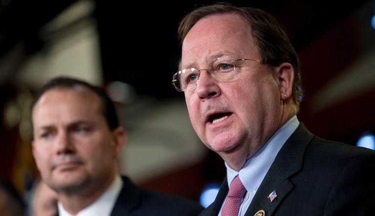 Representative Bill Flores, a Republican from Texas, speaks during a news conference on the Department of Homeland Security (DHS) funding bill with Senator Michael "Mike" Lee, a Republican from Utah, left, in Washington, D.C., U.S., on Thursday, Feb. 12, 2015.