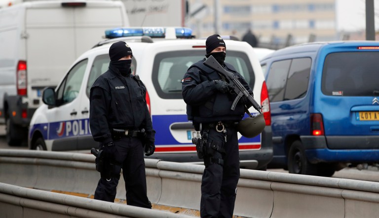 German police officers control cars at the French-German border following a shooting in Strasbourg, eastern France, Wednesday, Dec. 12, 2018. A man who had been flagged as a possible extremist sprayed gunfire near the city of Strasbourg's famous Christmas market Tuesday, killing three people, wounding 12 and sparking a massive manhunt. France immediately raised its terror alert level.