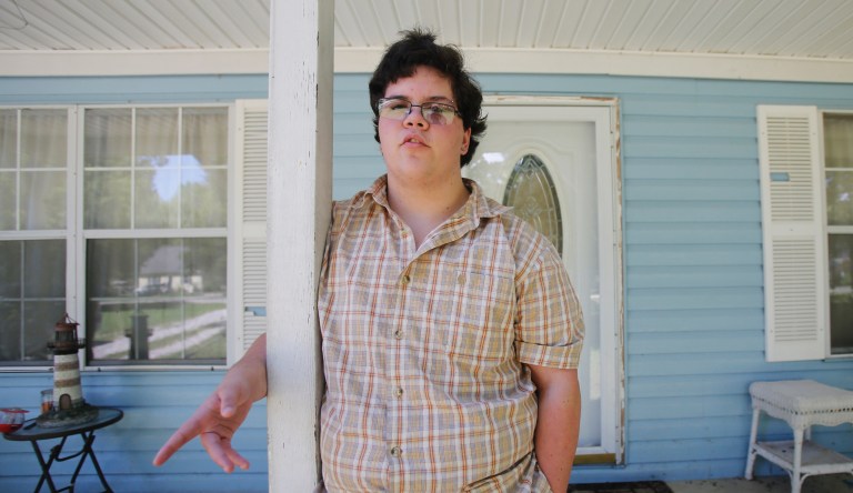 Transgender high school student Gavin Grimm poses in front of his home in Gloucester, Va., Monday, Aug. 22, 2016.  A Virginia school board is expected on Monday to formally ask the U.S. Supreme Court to hear a case brought by a transgender teen who wants to use the boys restroom at school.
