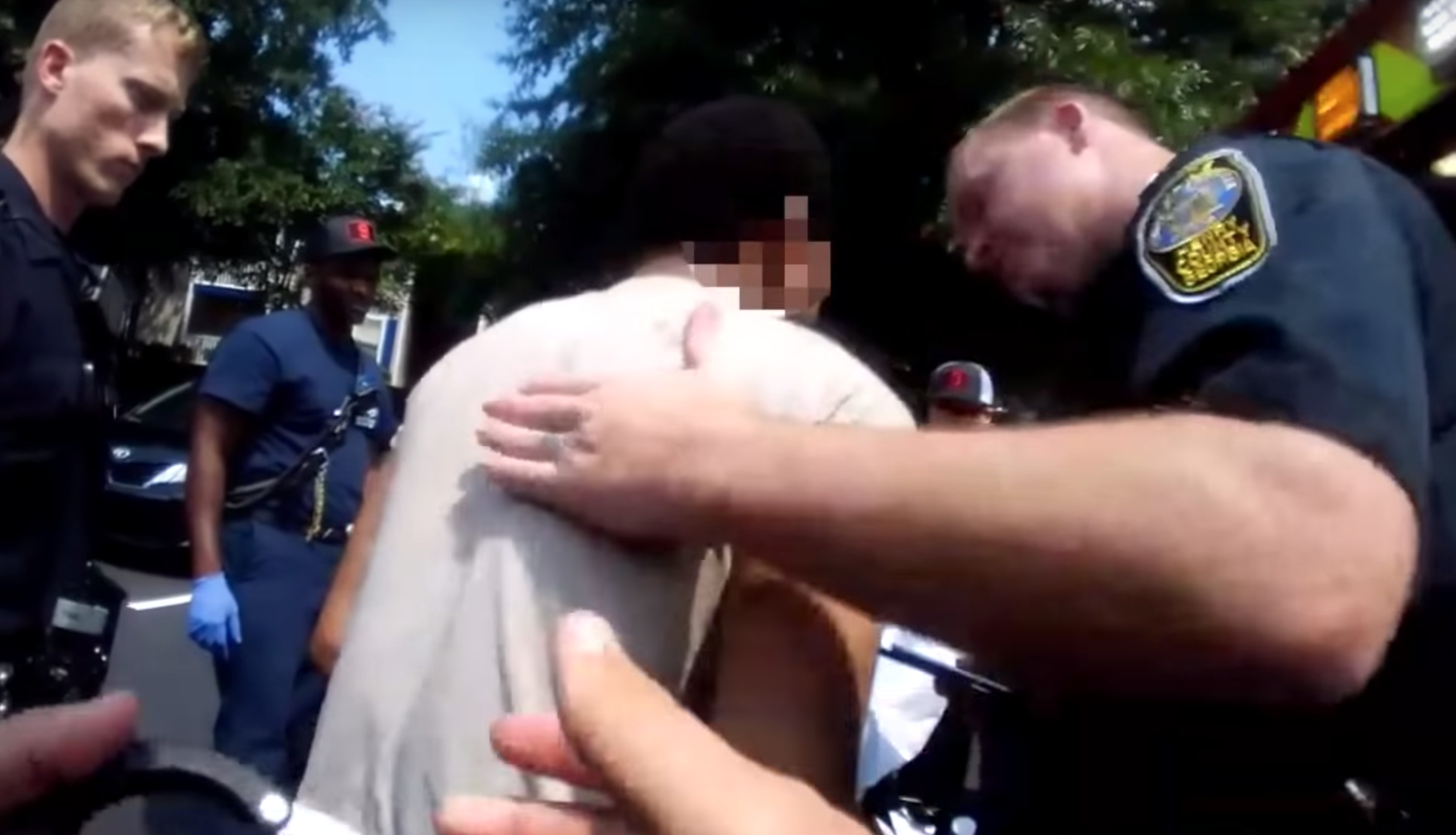 WATCH: Police stop distraught father from killing himself: ‘Your son needs you!’