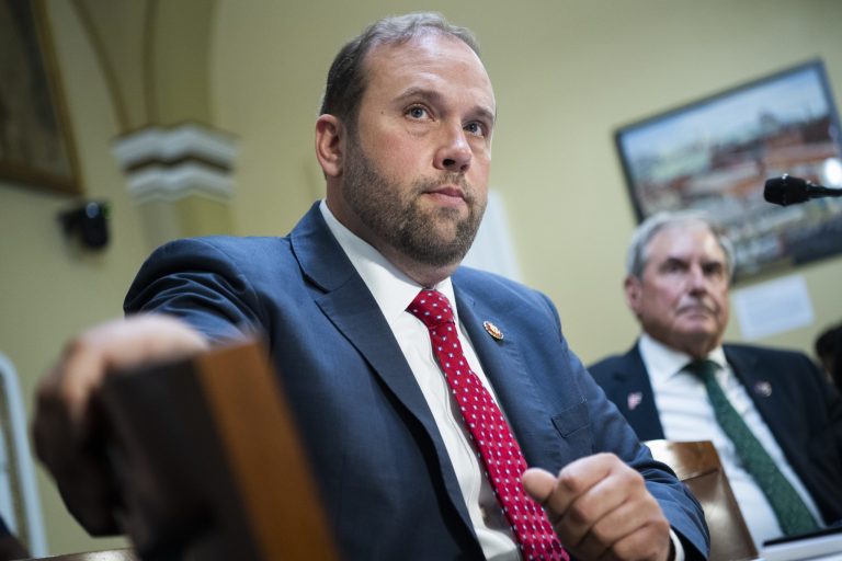 New Ways and Means Committee Chairman Rep. Jason Smith, R-Mo., left, and John Yarmuth, D-Ky., listen during a House Rules Committee hearing on the budget.