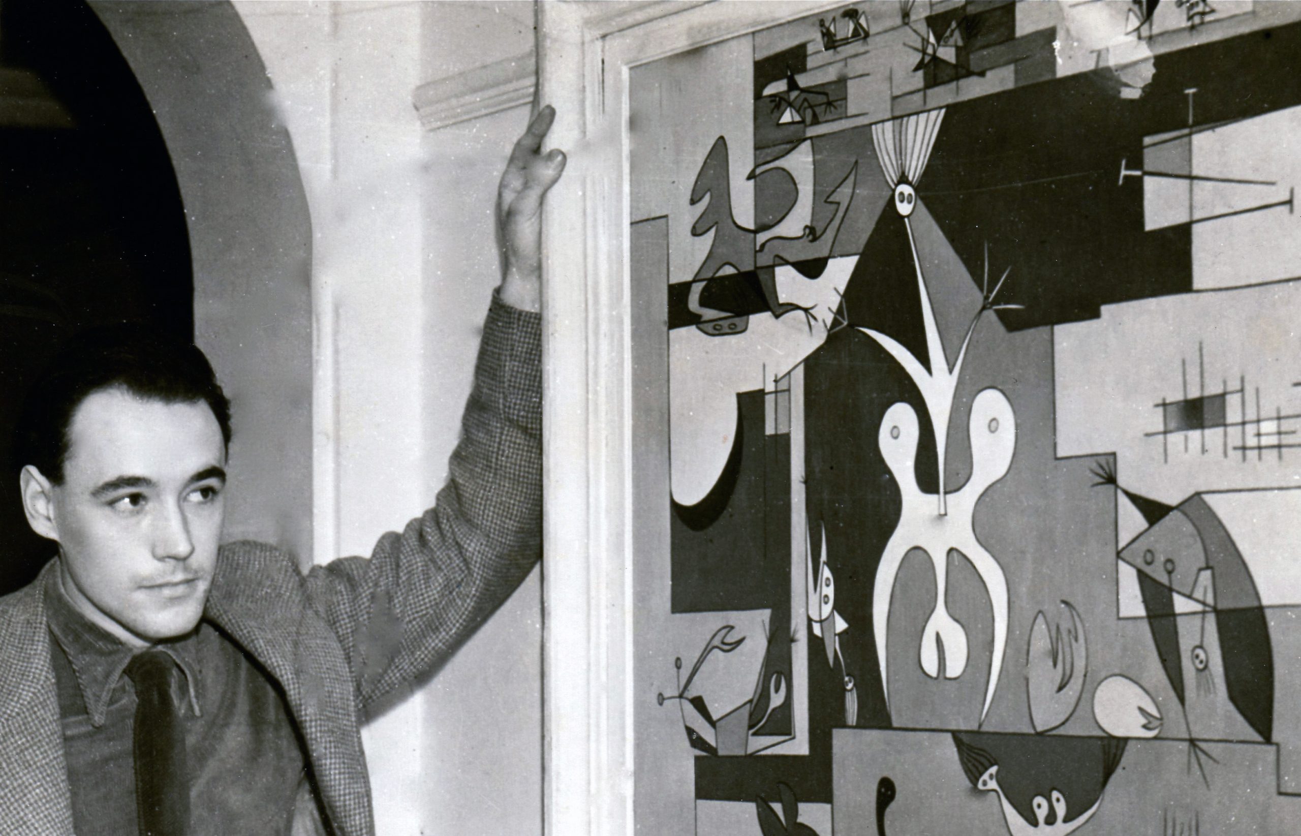 Desmond Morris in 1950 with his painting ‘The City’