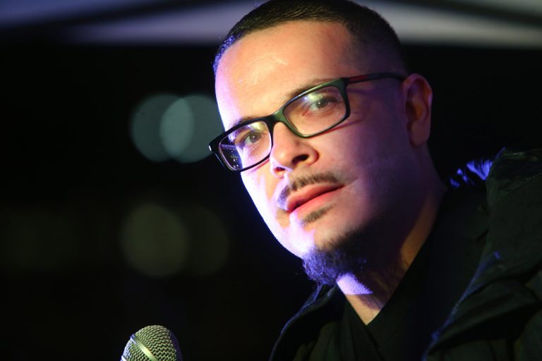 Shaun King, a Black Lives Matter leader, speaks at a rally.