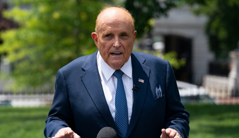 Rudy Giuliani, a personal attorney for President Donald Trump, talks with reporters outside the White House, Wednesday, July 1, 2020, in Washington.