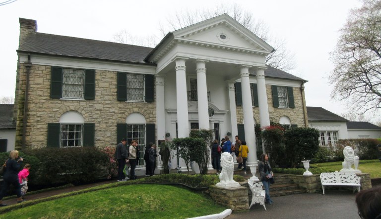 This March 13, 2017 photo shows visitors getting ready to tour Graceland in Memphis, Tenn. Elvis Presley bought the mansion _ which is small by 21st century standards _ in 1957 and lived there until his death 20 years later.