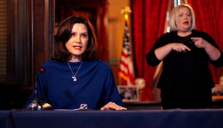 In a pool photo provided by the Michigan Office of the Governor, Gov. Gretchen Whitmer addresses the state during a speech in Lansing, Mich., Monday, March 30, 2020.