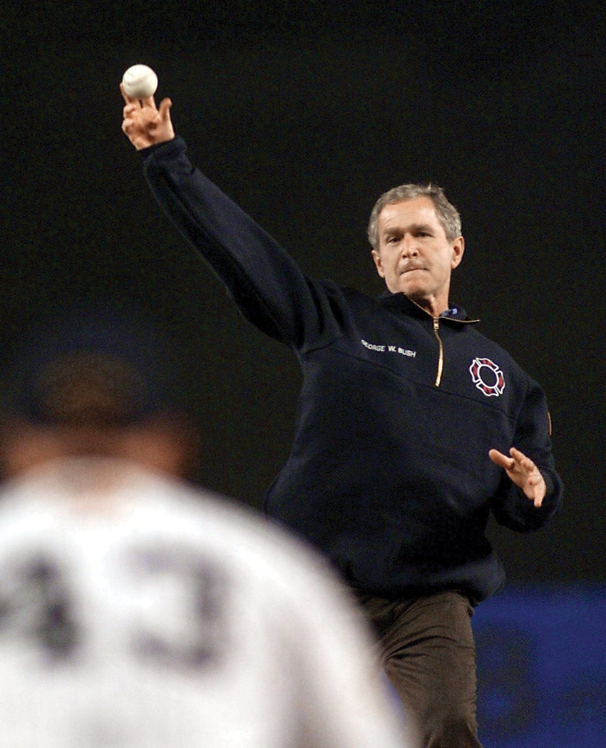 George W. Bush throwing out the first pitch during Game 3 of the World Series in Yankee Stadium, just weeks after 9/11.