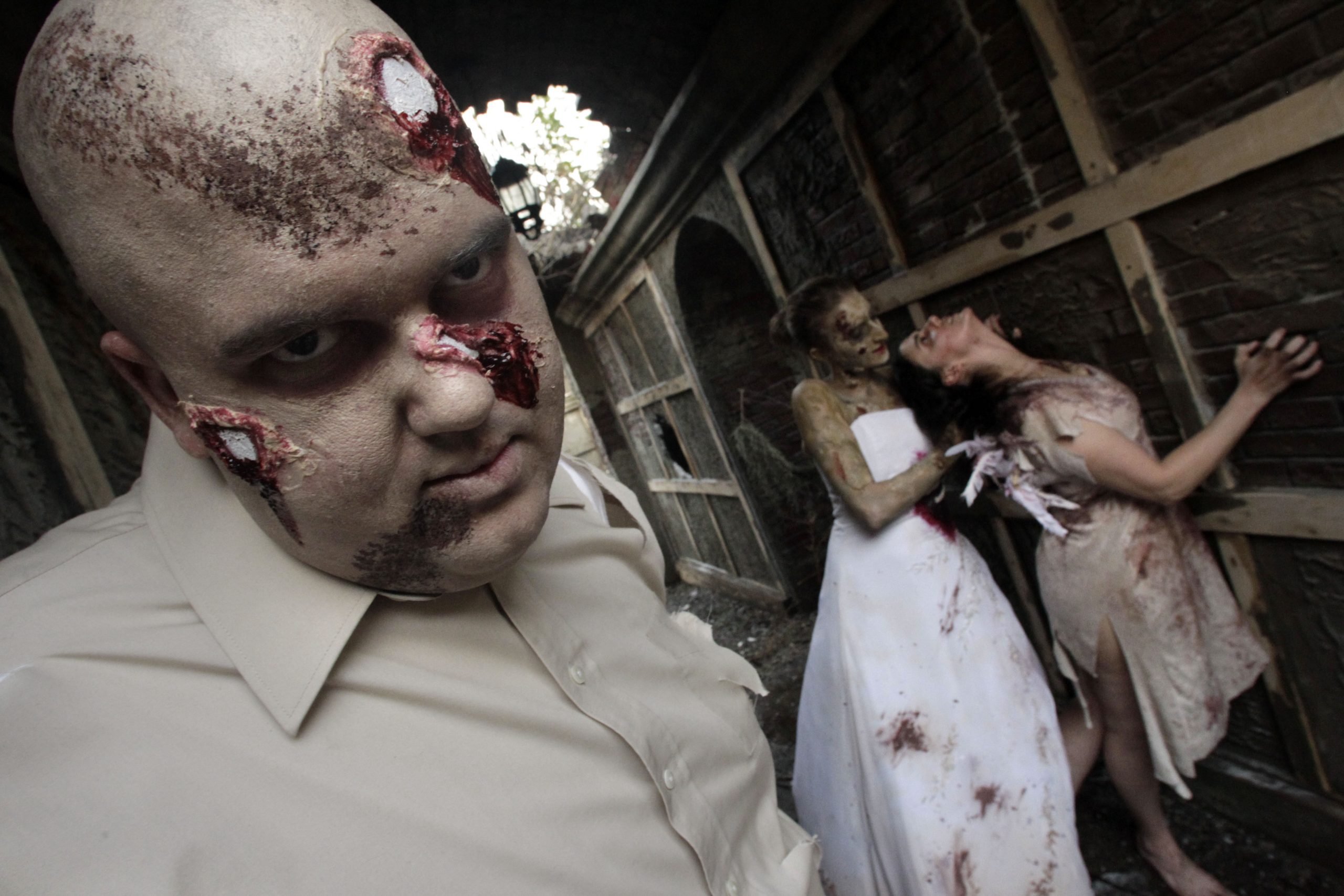 Liam Vasquez, 2, left and his father, Will Vasquez, right, try on Halloween masks at a Target department store on Wednesday, Oct. 3, 2018, in Pembroke Pines, Fla. Discounters like Walmart and Target are expanding their costume offerings and creating designated sections where customers can find more of their Halloween needs in one place.