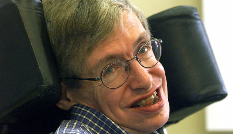 FILE - In this Wednesday, July 21, 1999 file photo Professor Stephen Hawking smiles during a news conference at the University of Potsdam, near Berlin, Germany. Hawking, whose brilliant mind ranged across time and space though his body was paralyzed by disease, has died, a family spokesman said early Wednesday, March 14, 2018.