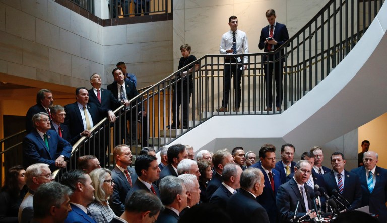 House Republicans gather for a news conference after Deputy Assistant Secretary of Defense Laura Cooper arrived for a closed door meeting to testify as part of the House impeachment inquiry into President Donald Trump, Wednesday, Oct. 23, 2019, on Capitol Hill in Washington.