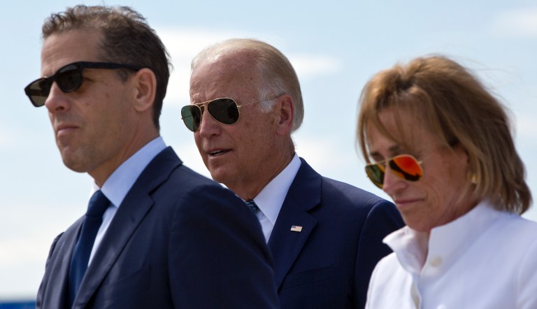 Family members gather for a road naming ceremony with U.S. Vice President Joe Biden, centre, his son Hunter Biden, left, and his sister Valerie Biden Owens, right, joined by other family members during a ceremony to name a national road after his late son Joseph R. "Beau" Biden III, in the village of Sojevo, Kosovo, on Wednesday, Aug. 17, 2016. 