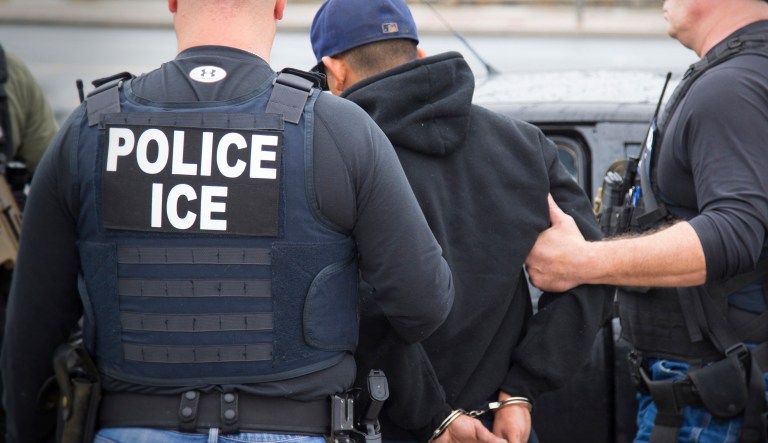 This Tuesday, Feb. 7, 2017, photo, released by U.S. Immigration and Customs Enforcement, shows foreign nationals being arrested during a targeted enforcement operation conducted by U.S. Immigration and Customs Enforcement.