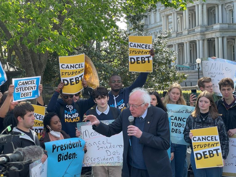 Vermont Sen. Bernie Sanders speaks at a rally outside the White House grounds on canceling student loans. 