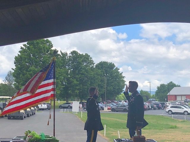 CARLISLE, Pa. â With the Army War College barracks to his right, Col. Brian Fickel takes his officer's oath with Col. Kevin McAninch.